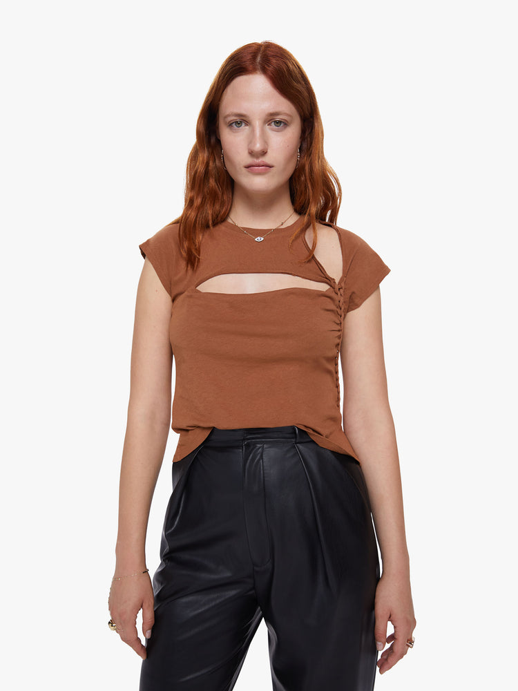 Front view of a womens fitted crew neck tee in brown featuring a chest and shoulder cutout and braided details.
