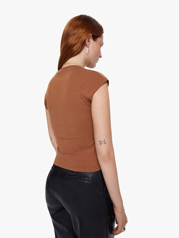 Back view of a womens fitted crew neck tee in brown featuring a chest and shoulder cutout and braided details.