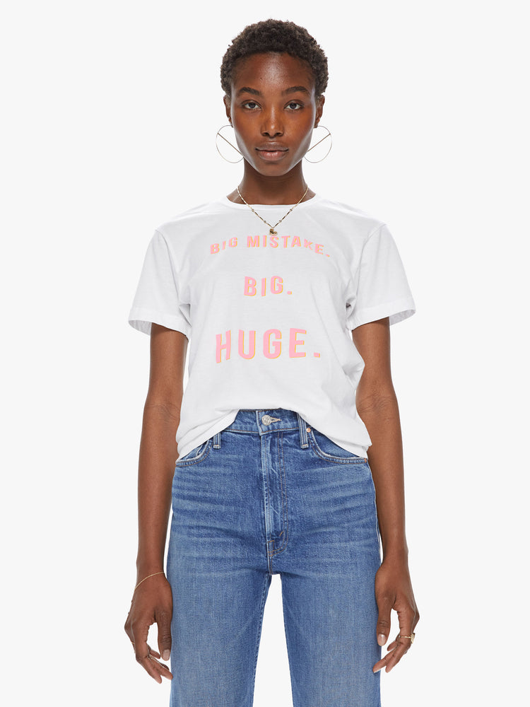 front view of a women's white t-shirt featuring a pink graphic which reads "BIG MISTAKE. BIG. HUGE"