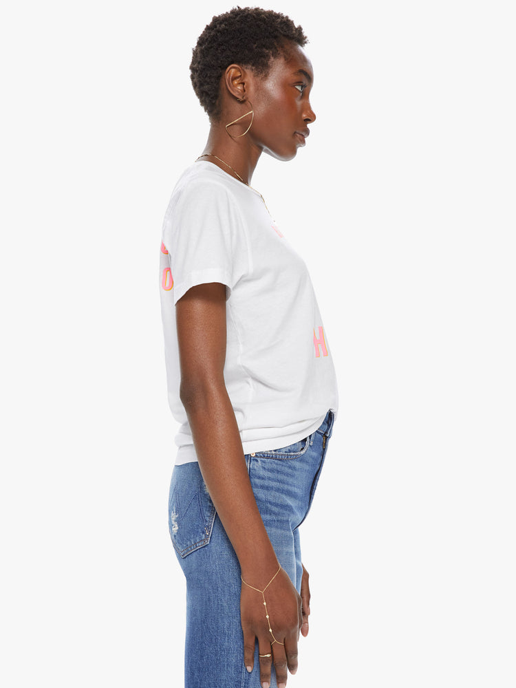Side view of a women's white t-shirt featuring a pink graphic which reads "BIG MISTAKE. BIG. HUGE"