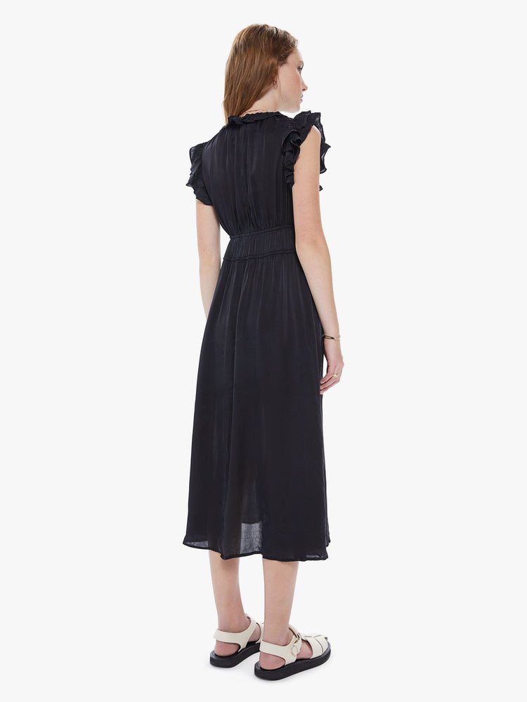 Back view of a womens black midi dress, featuring sleeveless ruffles, a deep v neck, and a smocked high waist.
