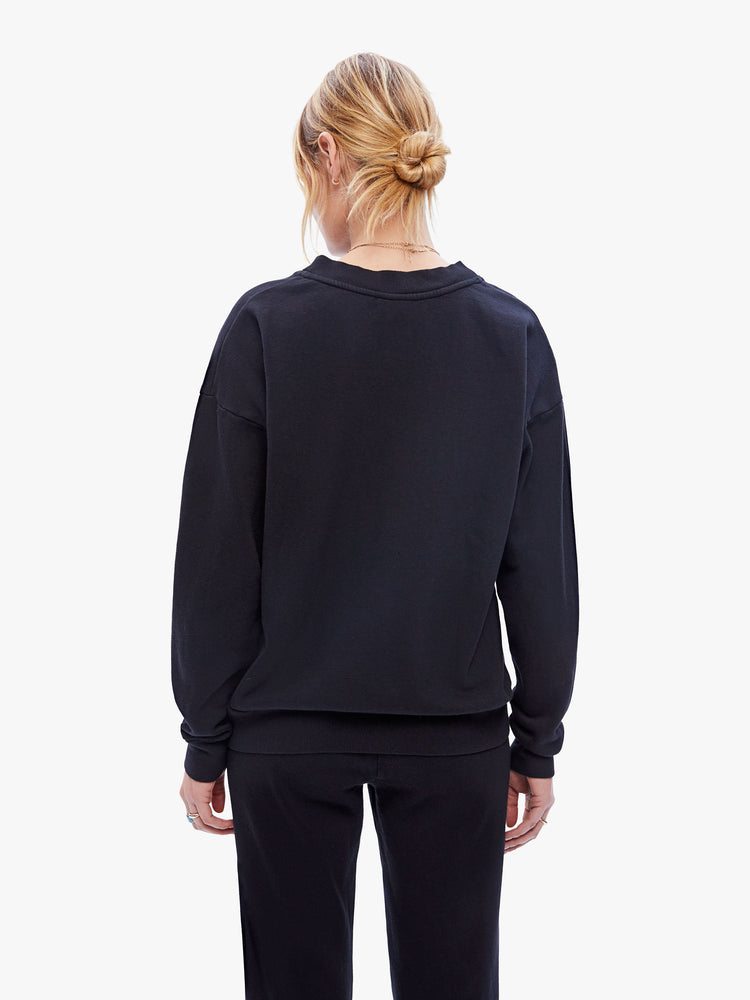 Back view of a womens black sweatshirt featuring a crew neck with dropped sleeves.