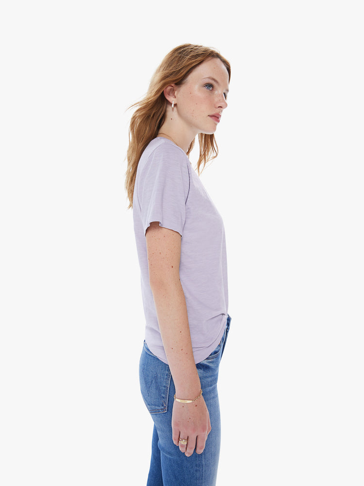 Side view of a woman in a classic crewneck from American heritage brand Velva Sheen with a slightly boxy shop, crafted from 100% cotton this orchid purple tee gets better every wear
