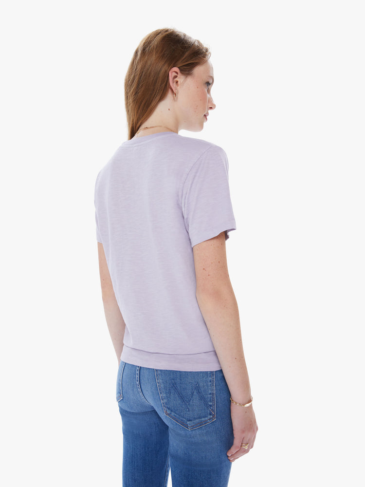 Back view of a woman in a classic crewneck from American heritage brand Velva Sheen with a slightly boxy shop, crafted from 100% cotton this orchid purple tee gets better every wear