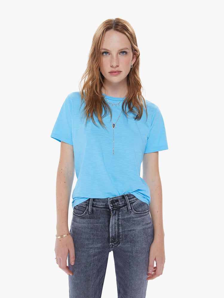 Front view of a woman in a classic crewneck from American heritage brand Velva Sheen with a slightly boxy shop, crafted from 100% cotton this bright blue tee gets better every wear