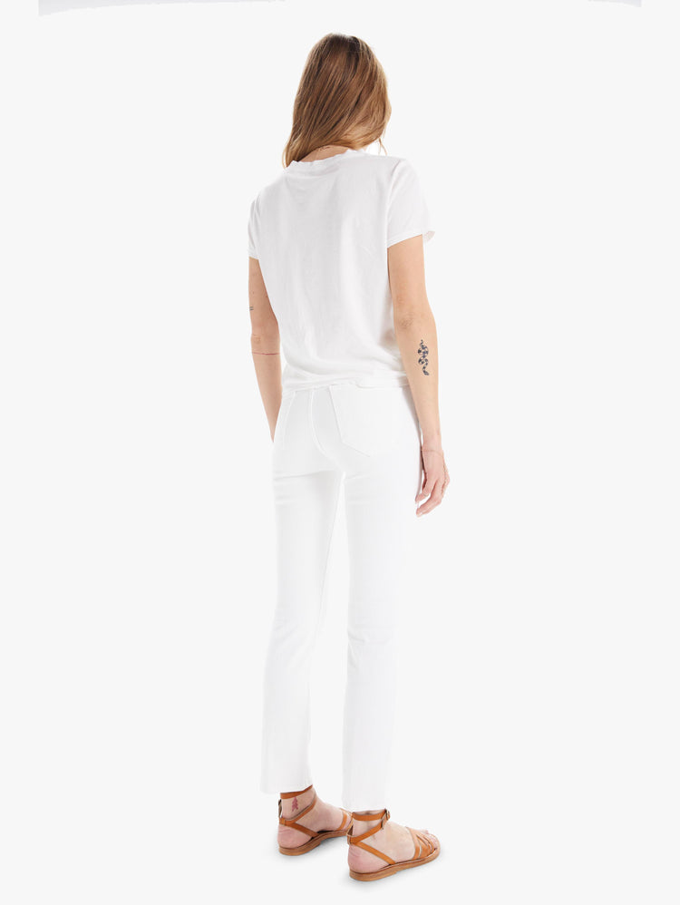 back view of women's white mid rise straight leg jean with ankle inseam, zip fly, and clean hem