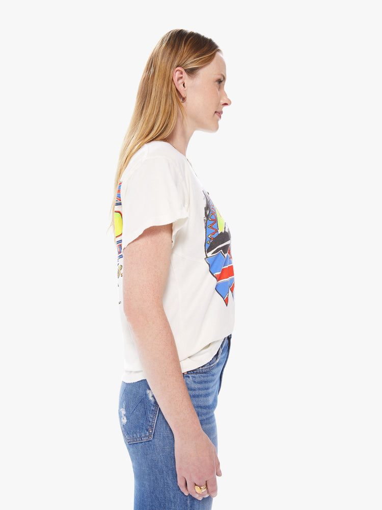 Side view of a women's off-white t-shirt with a blue, red, and neon yellow The Who graphic featuring "The Kids are Alright"